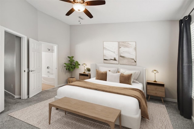 10407 Westpark Preserve Blvd, Tampa, FL 33625 - carpeted bedroom featuring baseboards, ensuite bath, lofted ceiling, and ceiling fan