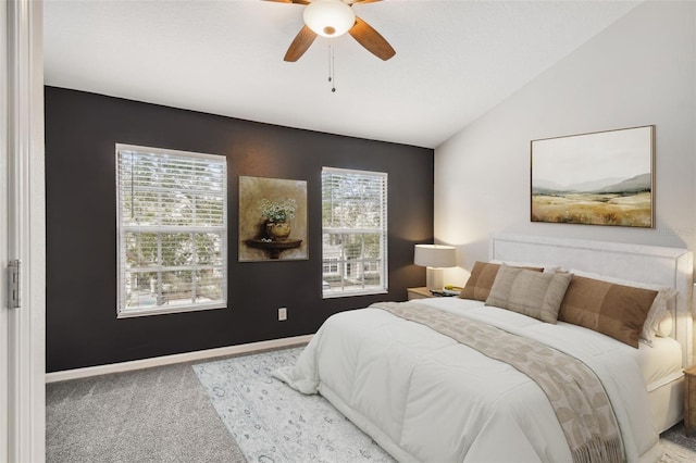 10407 Westpark Preserve Blvd, Tampa, FL 33625 - bedroom featuring carpet flooring, multiple windows, lofted ceiling, baseboards, and ceiling fan