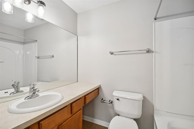 10407 Westpark Preserve Blvd, Tampa, FL 33625 - bathroom with toilet, vanity, tile patterned flooring, and shower / bath combination