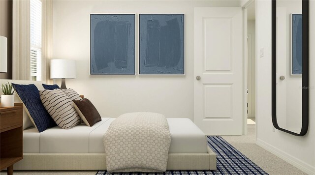 bedroom featuring baseboards and carpet floors