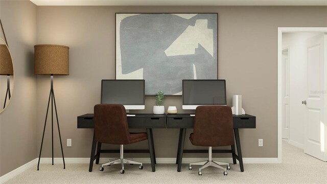 office with baseboards and carpet floors