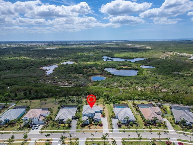 814 Manns Harbor Dr, Apollo Beach, FL 33572 - aerial view of property and surrounding area featuring a large body of water and nearby suburban area