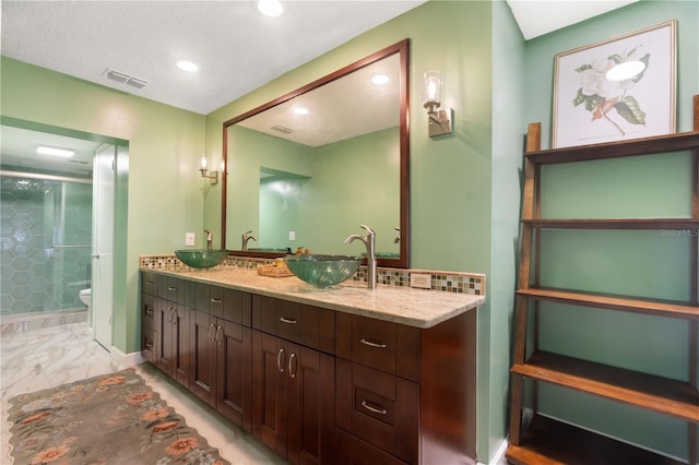 full bath with visible vents, toilet, recessed lighting, a shower stall, and a sink