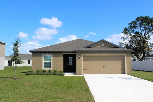 639 Gila Dr, Poinciana, FL 34759 - single story home with driveway, a front yard, stucco siding, an attached garage, and fence