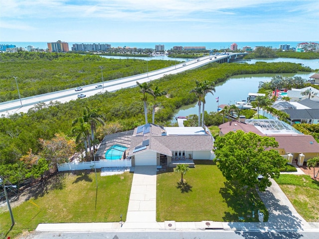 7906 Bayshore Dr, Seminole, FL 33776 - aerial view featuring a view of city and a water view