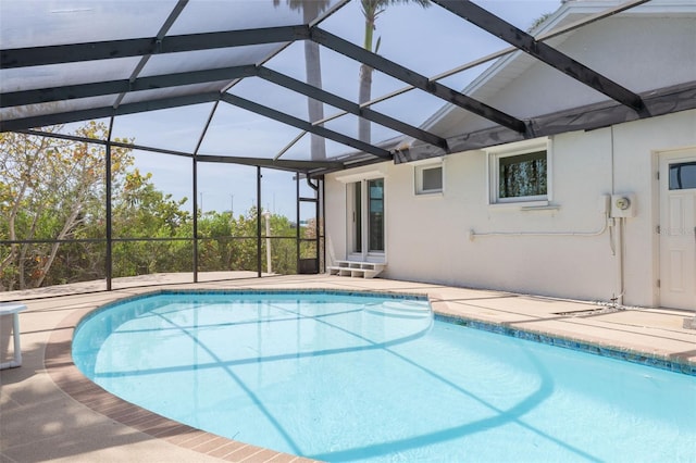 7906 Bayshore Dr, Seminole, FL 33776 - pool featuring a lanai and a patio