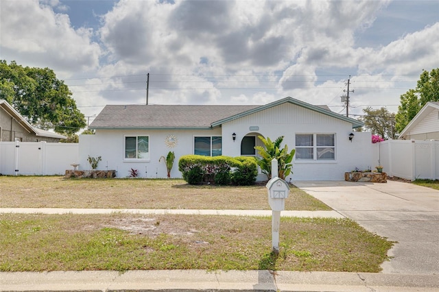 2605 Fulton St SW, Largo, FL 33774 - ranch-style home with stucco siding and driveway