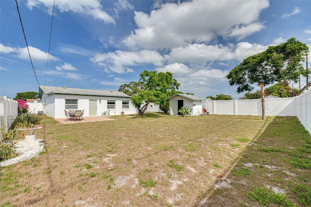 2605 Fulton St SW, Largo, FL 33774 - view of yard featuring a patio