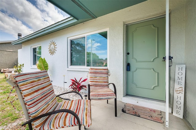 2605 Fulton St SW, Largo, FL 33774 - property entrance with stucco siding