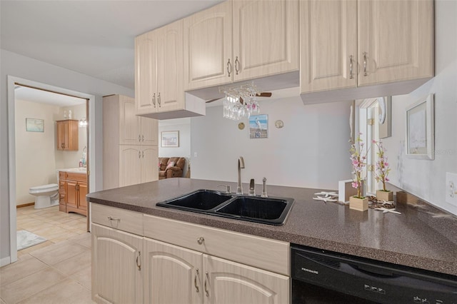 2605 Fulton St SW, Largo, FL 33774 - kitchen featuring a sink, black dishwasher, dark countertops, and light tile patterned floors