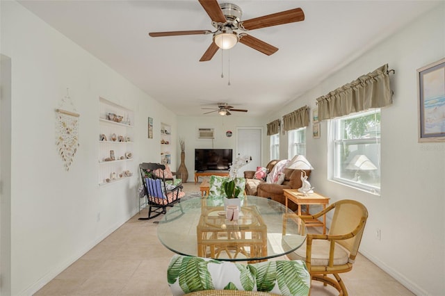 2605 Fulton St SW, Largo, FL 33774 - living area with ceiling fan, light tile patterned flooring, and baseboards