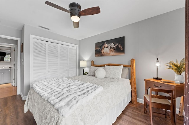 170 Ingrid Pl, Oldsmar, FL 34677 - bedroom with dark wood finished floors, baseboards, visible vents, and a closet