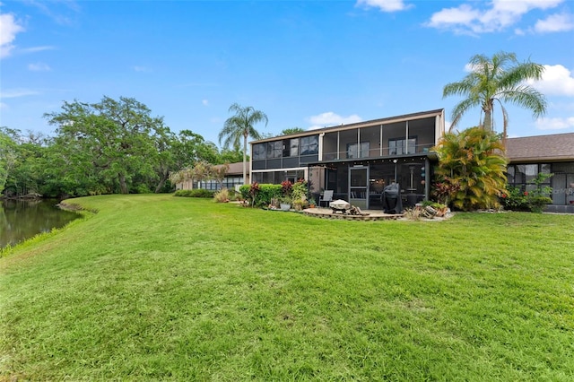170 Ingrid Pl, Oldsmar, FL 34677 - view of yard featuring a sunroom and a water view