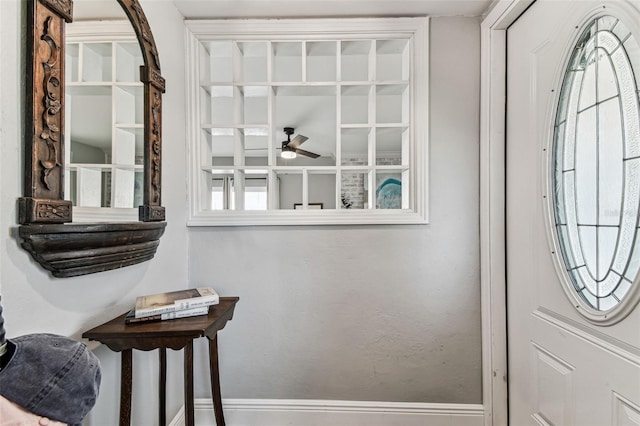 610 N Woodlynne Ave, Tampa, FL 33609 - entryway with baseboards and ceiling fan