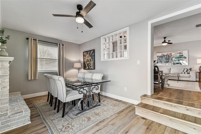 610 N Woodlynne Ave, Tampa, FL 33609 - dining space featuring wood finished floors, baseboards, and ceiling fan