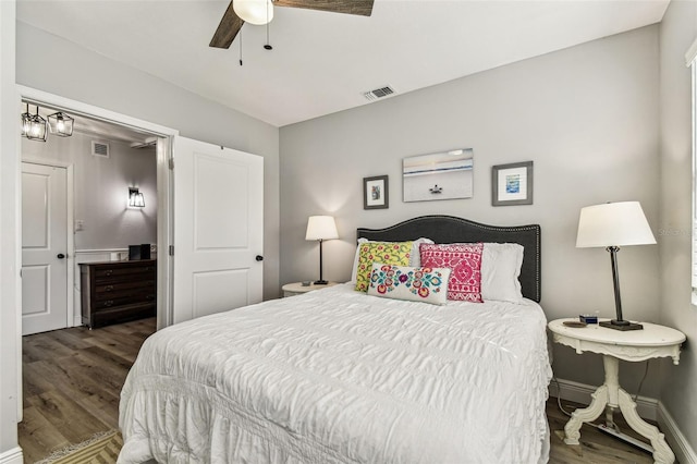 610 N Woodlynne Ave, Tampa, FL 33609 - bedroom featuring baseboards, visible vents, wood finished floors, and a ceiling fan