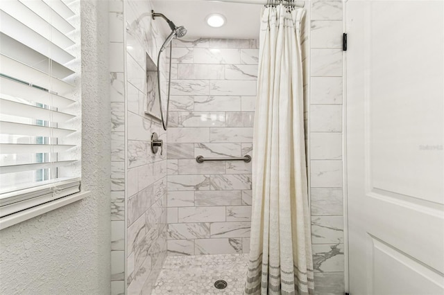 610 N Woodlynne Ave, Tampa, FL 33609 - bathroom featuring a stall shower