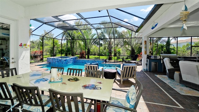 16612 5th Ave E, Bradenton, FL 34212 - view of patio / terrace featuring outdoor dining space, a pool with connected hot tub, and a lanai