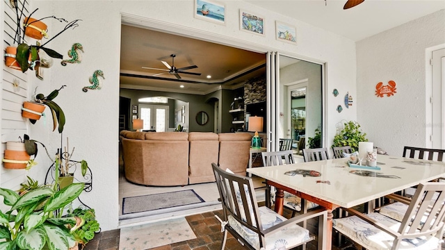 16612 5th Ave E, Bradenton, FL 34212 - dining space featuring ceiling fan, arched walkways, and recessed lighting