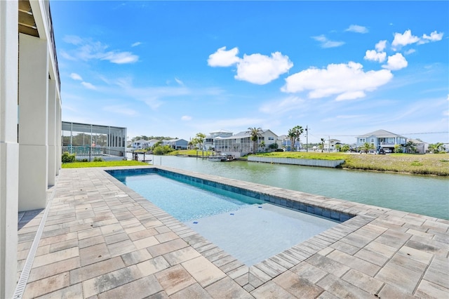 3496 Amberjack Dr, Hernando Beach, FL 34607 - outdoor pool with a residential view, a water view, and a patio