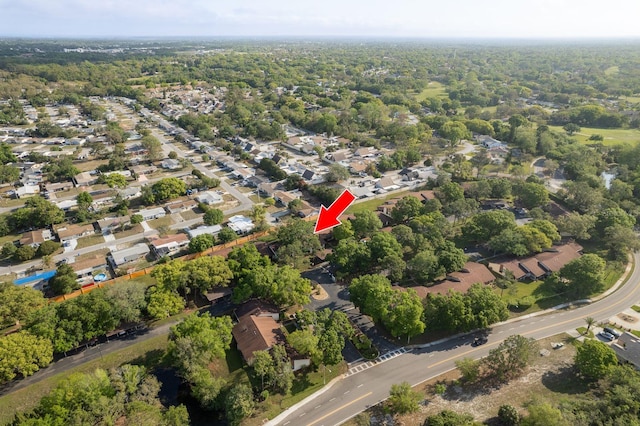 birds eye view of property with a residential view
