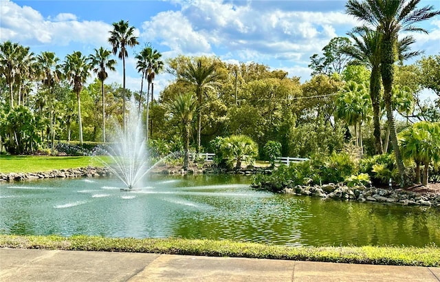 surrounding community with a water view