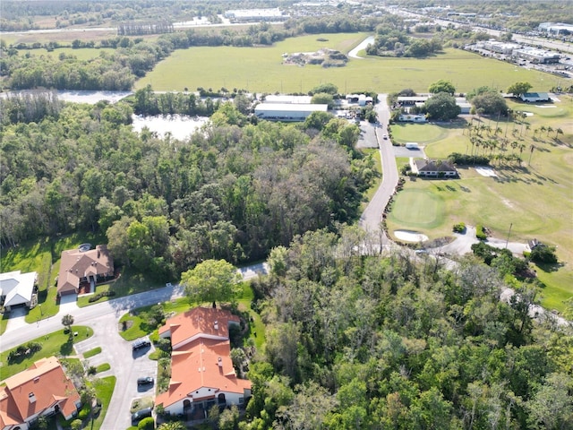 birds eye view of property with golf course view