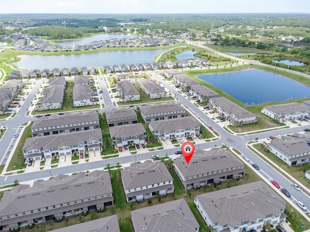 8299 Crescent Oaks Dr, New Port Richey, FL 34655 - drone / aerial view with a residential view and a water view