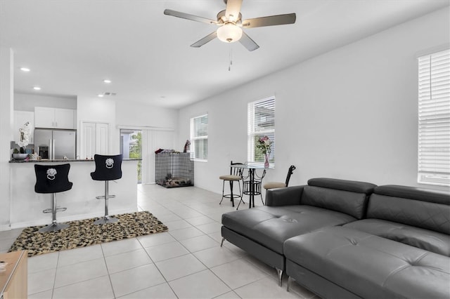 8299 Crescent Oaks Dr, New Port Richey, FL 34655 - living room with a ceiling fan, recessed lighting, and light tile patterned floors