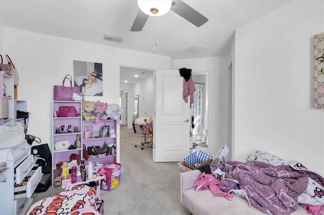 8299 Crescent Oaks Dr, New Port Richey, FL 34655 - carpeted bedroom with ceiling fan and visible vents