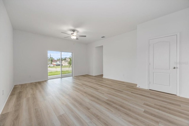 385 Begonia Ct, Poinciana, FL 34759 - empty room with ceiling fan and light wood-type flooring
