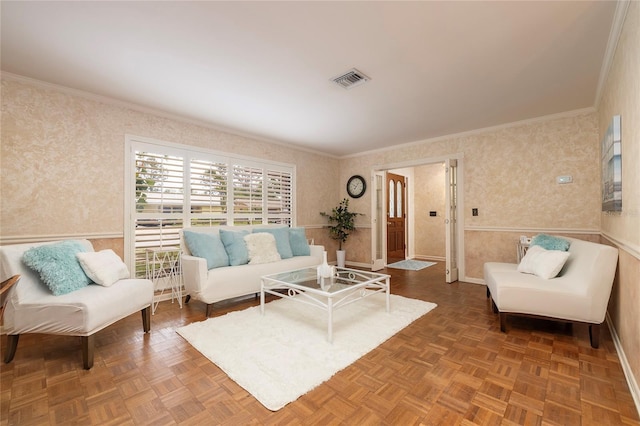 living room with wallpapered walls and crown molding
