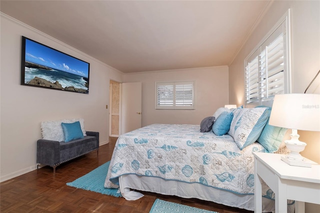 bedroom featuring crown molding and baseboards