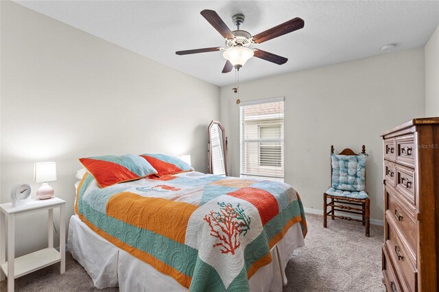 2404 Dovesong Trace Dr, Ruskin, FL 33570 - bedroom featuring carpet flooring, baseboards, and ceiling fan