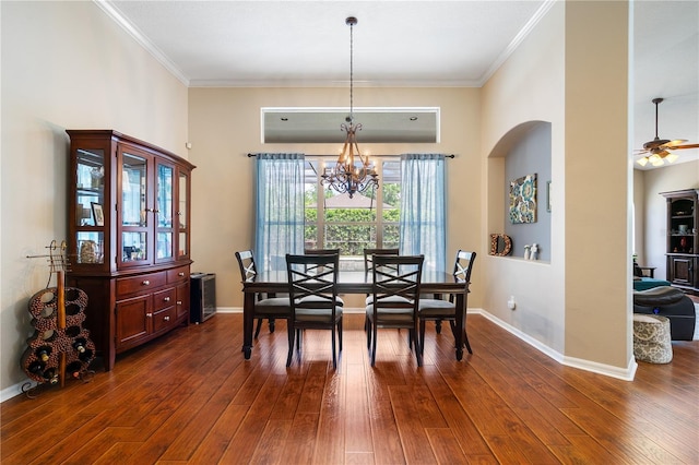 dining room featuring ornamental molding, dark wood-type flooring, and baseboards