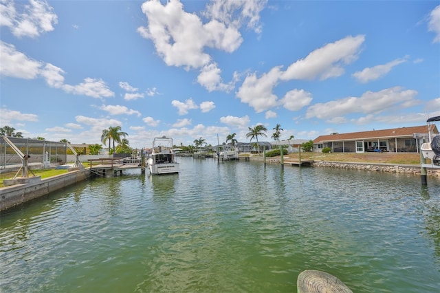 property view of water with a dock