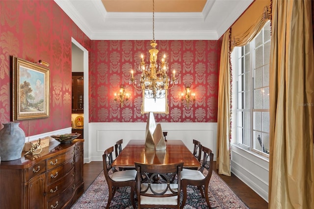 14817 Tudor Chase Dr, Tampa, FL 33626 - dining space featuring dark wood finished floors, a chandelier, wainscoting, and ornamental molding