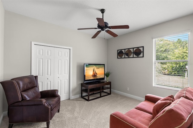 14817 Tudor Chase Dr, Tampa, FL 33626 - living area featuring light colored carpet, baseboards, and ceiling fan