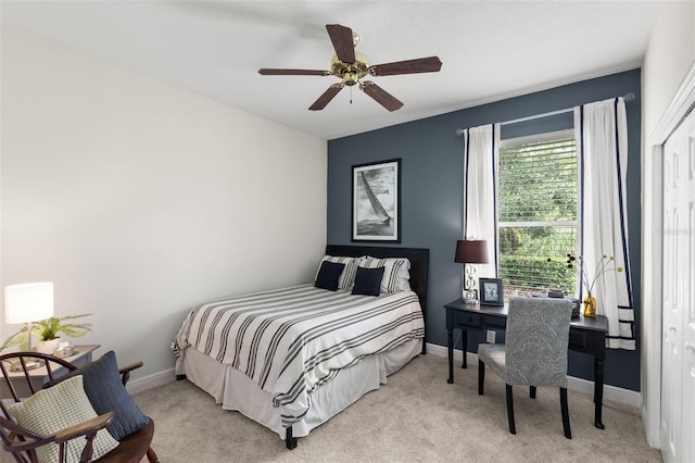 14817 Tudor Chase Dr, Tampa, FL 33626 - bedroom featuring light carpet, baseboards, and ceiling fan