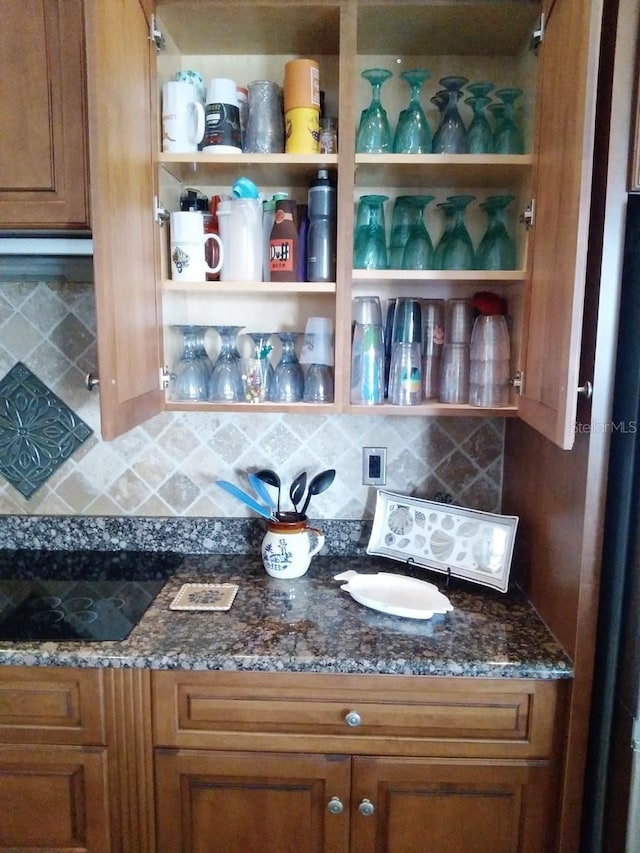interior space with brown cabinets and open shelves