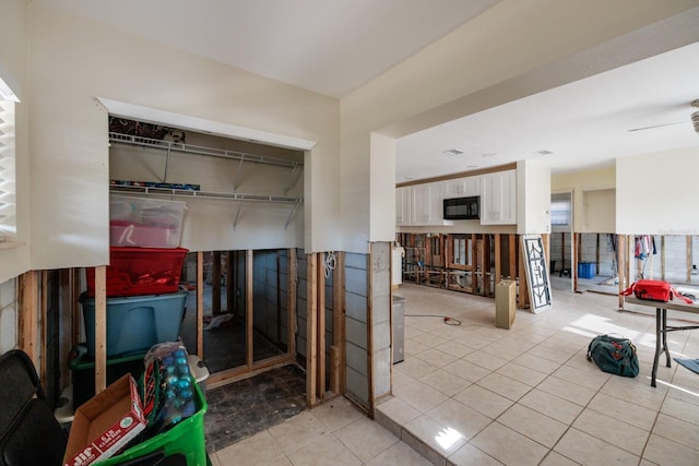 4126 Carson St NE, Saint Petersburg, FL 33703 - interior space with light tile patterned floors