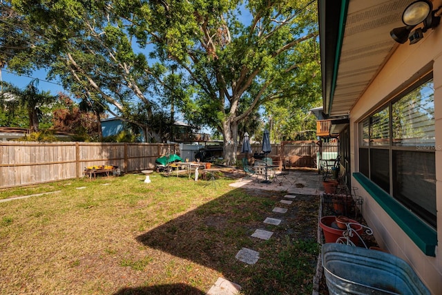 4126 Carson St NE, Saint Petersburg, FL 33703 - view of yard with a patio and a fenced backyard