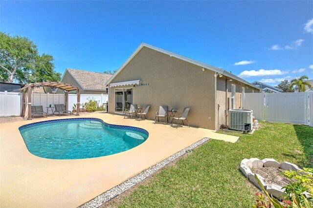 1666 Meadow Oak Ln, Tarpon Springs, FL 34689 - view of pool with a fenced backyard, a patio area, a pergola, and a gate