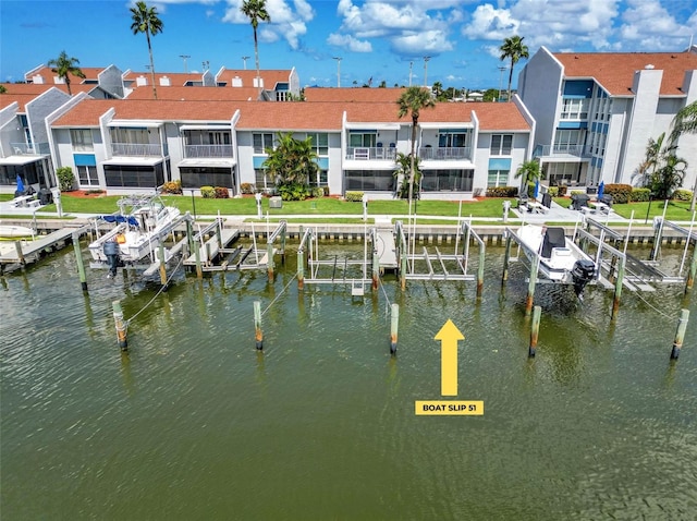 337 Rex Pl Unit E, Madeira Beach, FL 33708 - dock area with boat lift and a water view