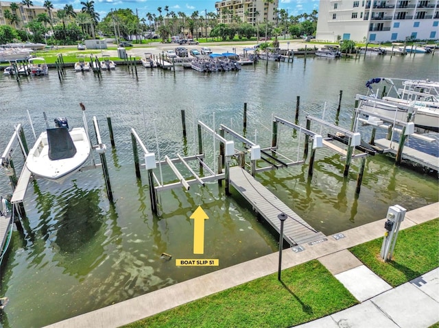 337 Rex Pl Unit E, Madeira Beach, FL 33708 - dock featuring boat lift and a water view
