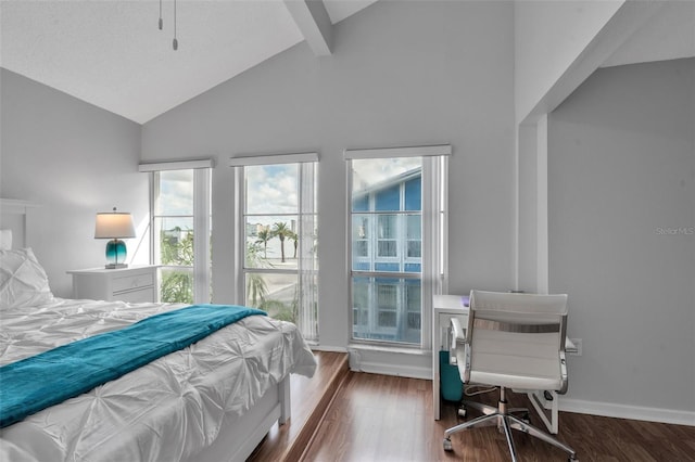 337 Rex Pl Unit E, Madeira Beach, FL 33708 - bedroom featuring wood finished floors, high vaulted ceiling, beamed ceiling, and baseboards