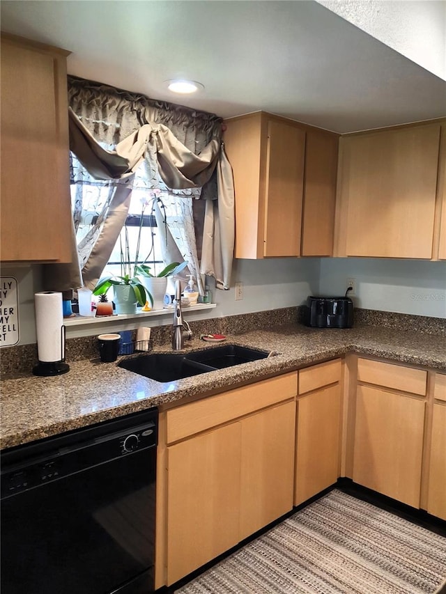 8810 41st St N, Pinellas Park, FL 33782 - kitchen featuring black dishwasher, dark countertops, and light brown cabinets