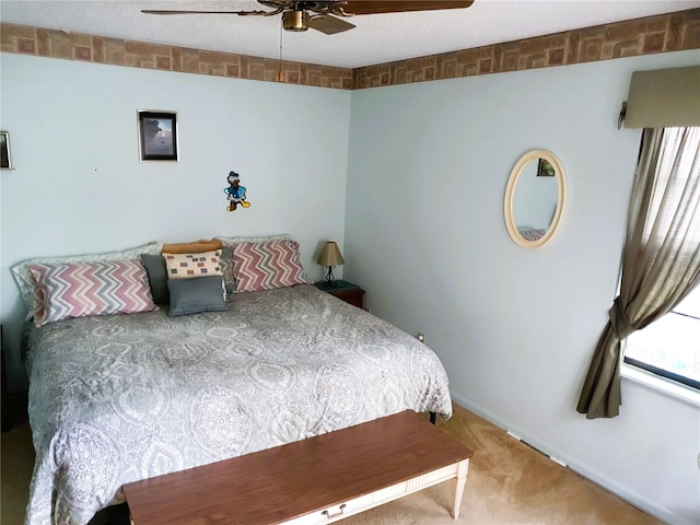 8810 41st St N, Pinellas Park, FL 33782 - carpeted bedroom with baseboards and ceiling fan