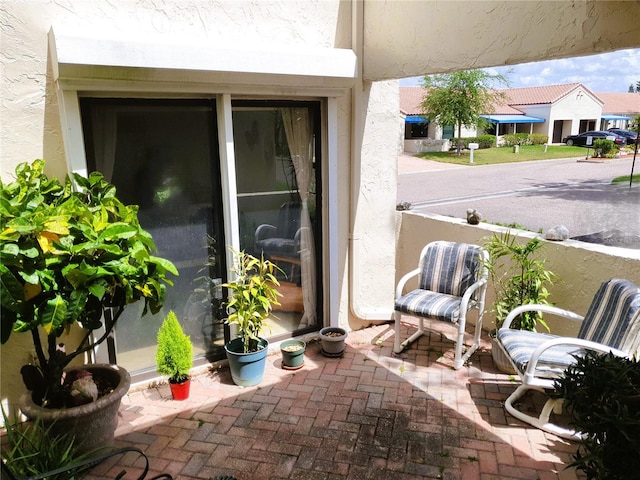 8810 41st St N, Pinellas Park, FL 33782 - property entrance featuring stucco siding