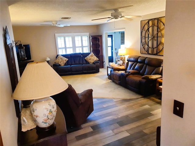 8810 41st St N, Pinellas Park, FL 33782 - living area featuring a ceiling fan and wood finished floors